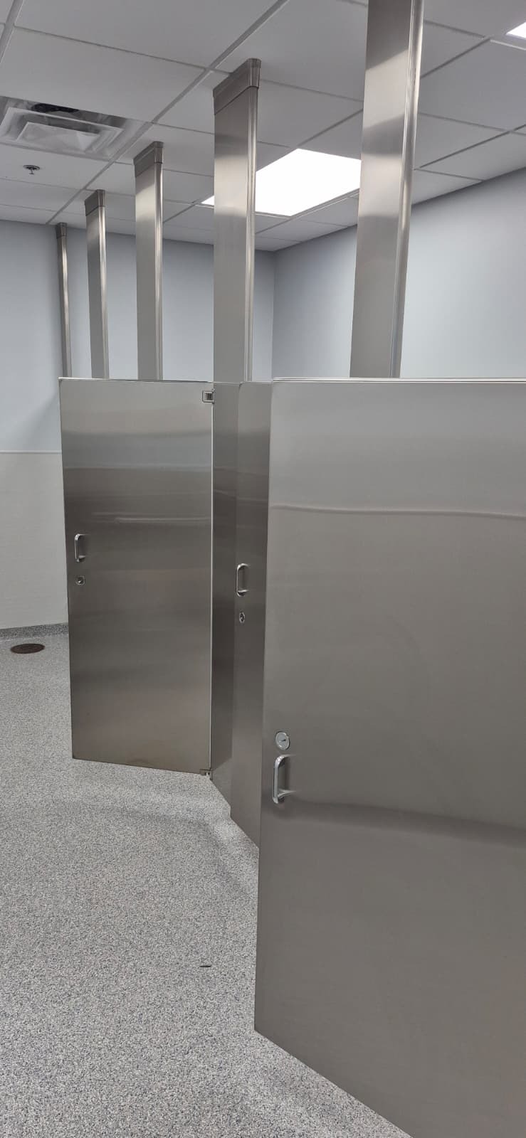 Ceiling-hung #4 finish stainless steel bathroom partitions